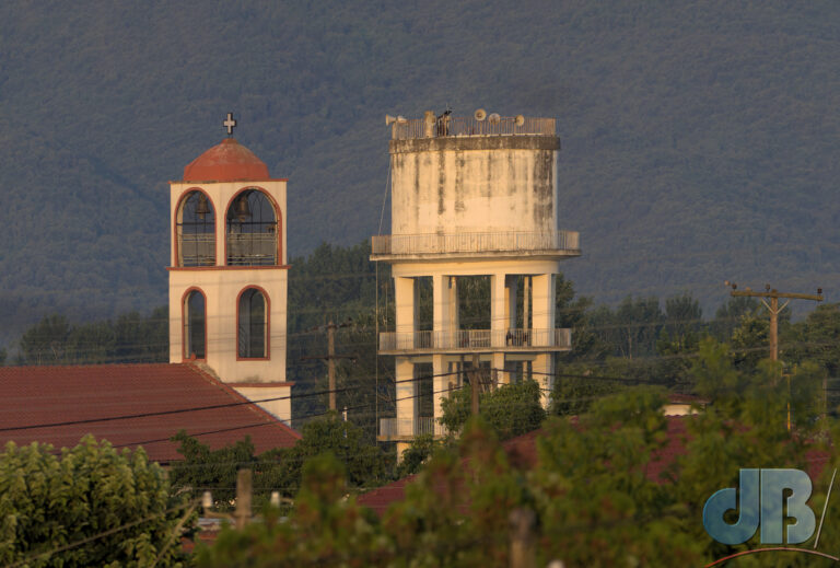 Our balcony view of the "twin towers" in Chrysochorafa - church and water